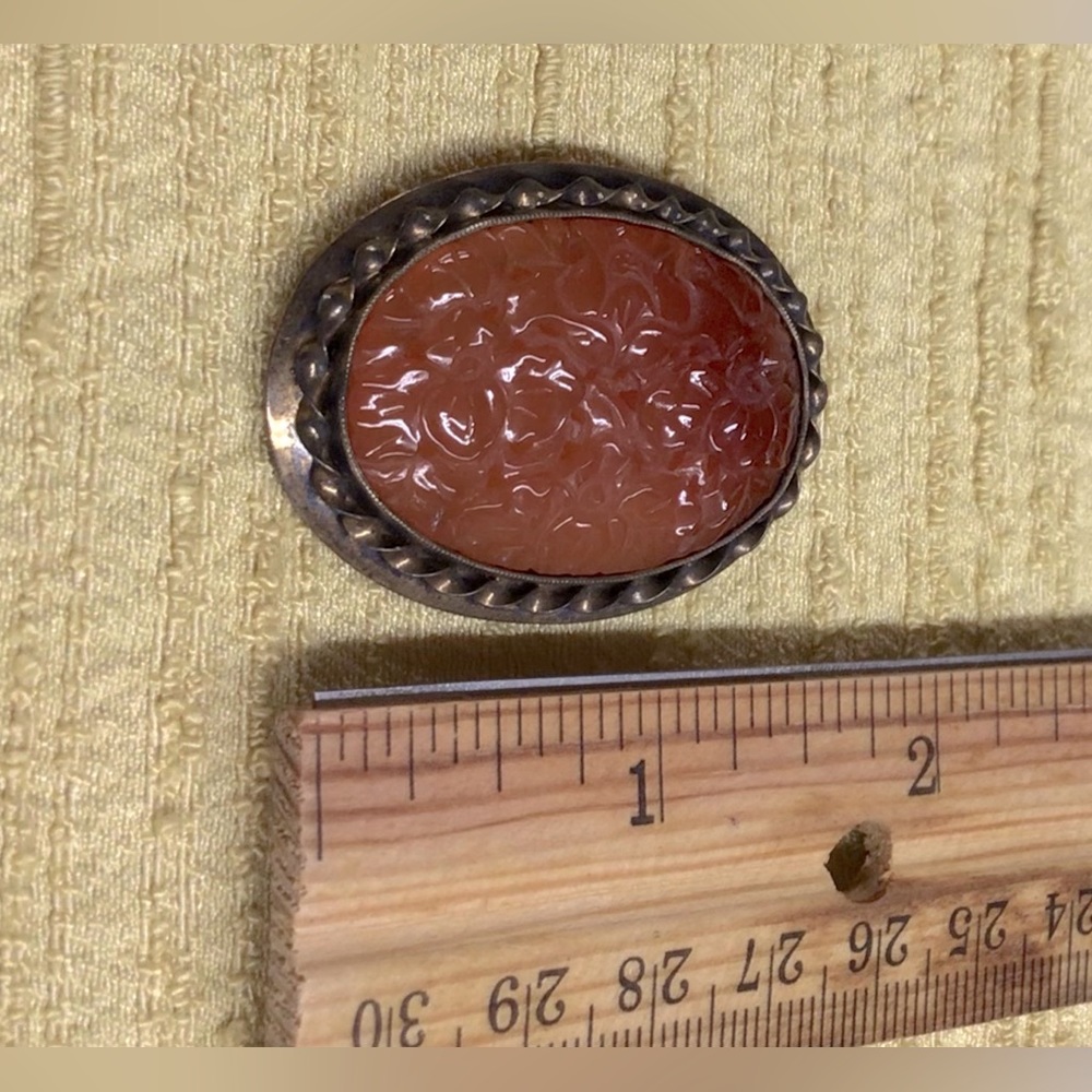 Sterling cameo brooch.